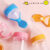 he Cheeky Kidzz Baby Fruit Shape Silicone Teether Teething Toys for Baby Textured Molar Teeth Soother Massager with Baby Silicone Spoon Feeding Bottle Combo(4 Months+) (Pink,Pink)